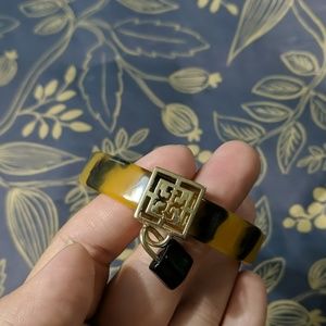 Tortoise cross and lock resin bracelet bangle
